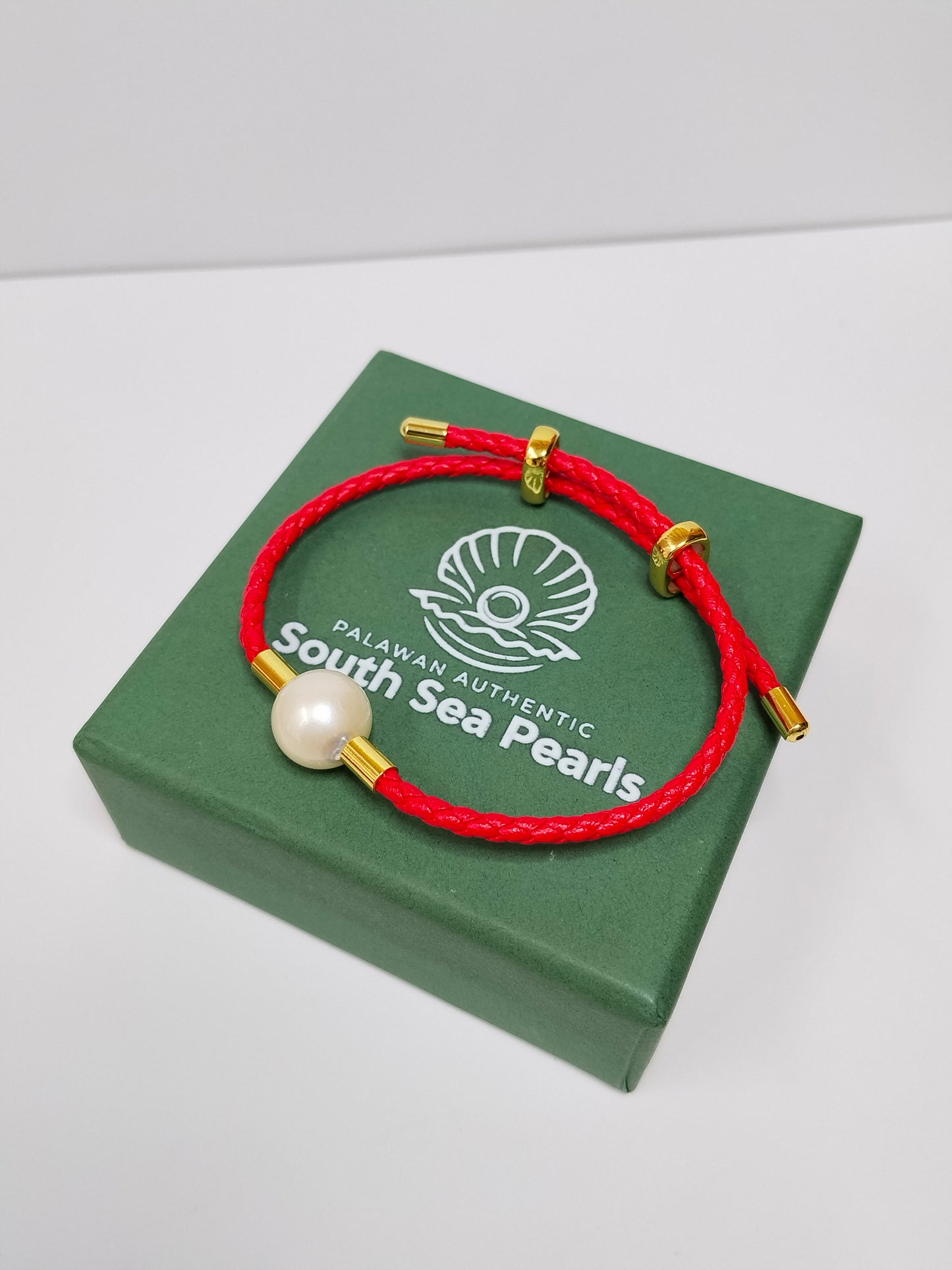 12mm Palawan Authentic White Color South Sea Pearl Bracelet in Leather Settings