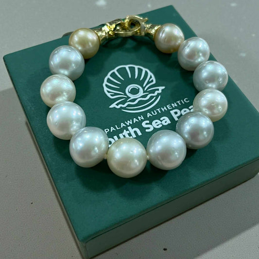 10.7 to 12.5mm Palawan Authentic White and Light Champagne Color SOuth Sea Pearl Bracelet in 5 Micron Lock Settings
