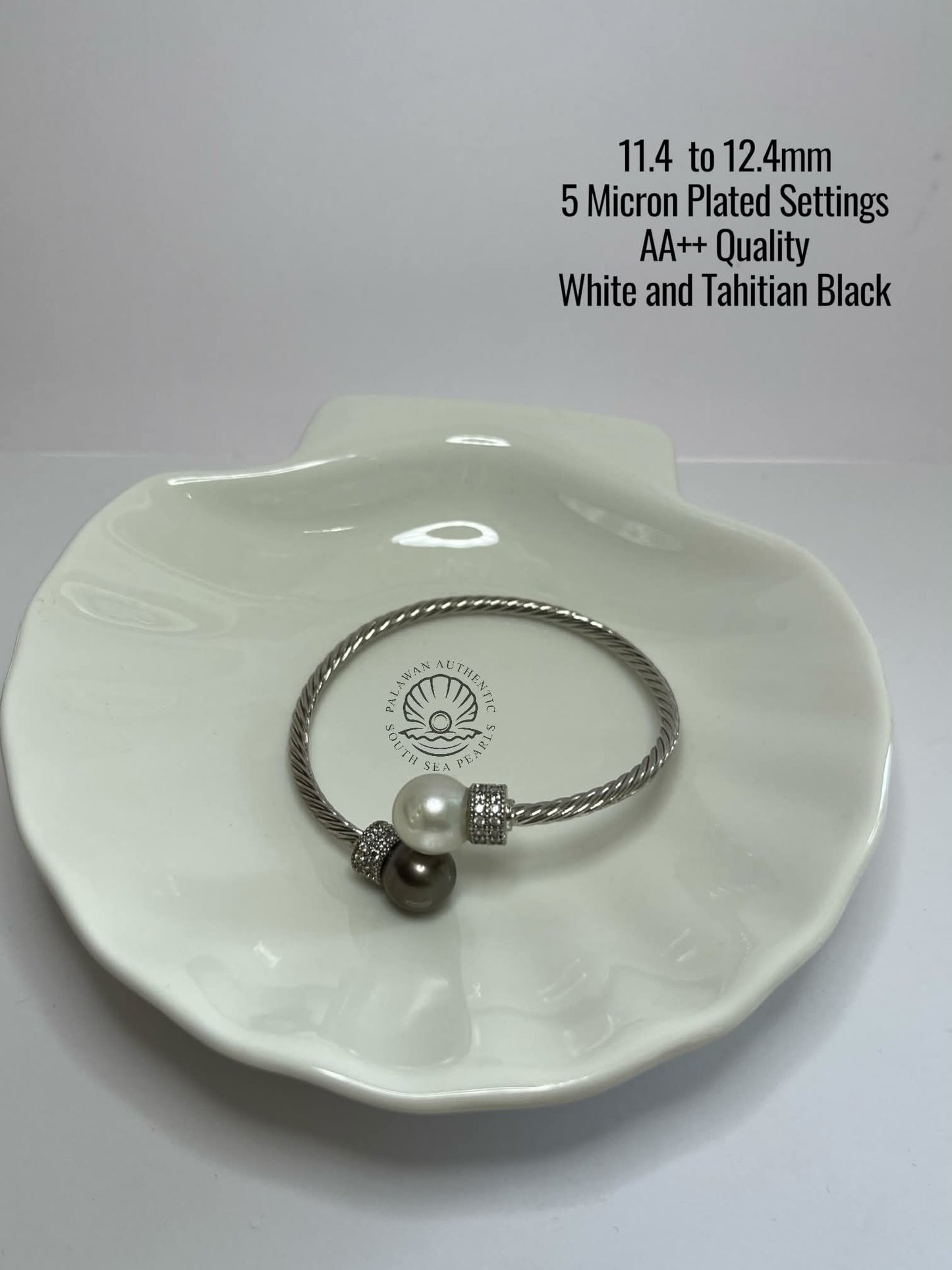 11.1 to 12.4mm Palawan Authentic White and Tahitian Black Color South Sea Pearl Bangle in 5 Micron Plated Settings