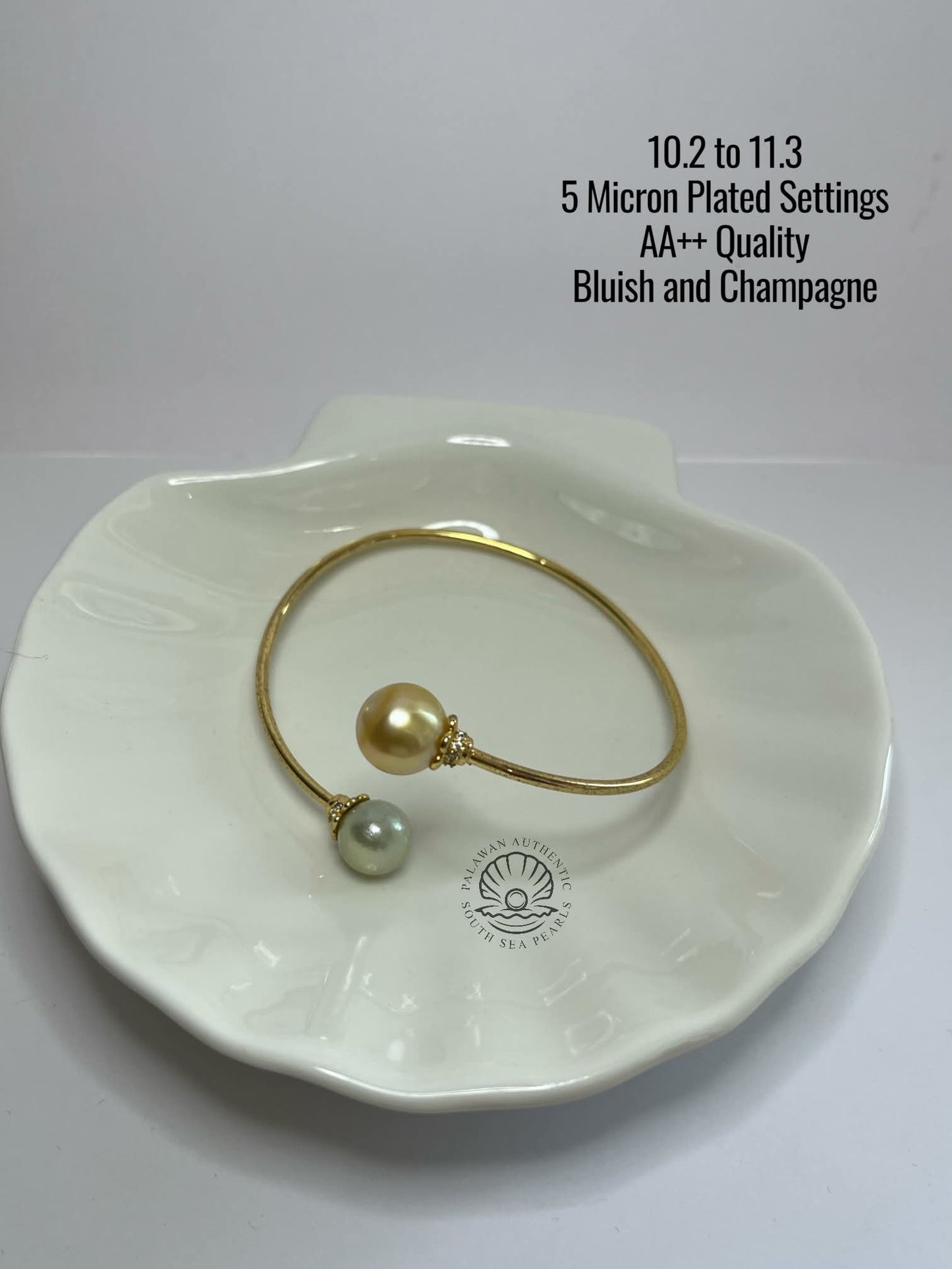 10.2 to 11.3mm Palawan Authentic Bluish and ChampagneColor South Sea Pearl Bangle in 5 Micron Plated Settings